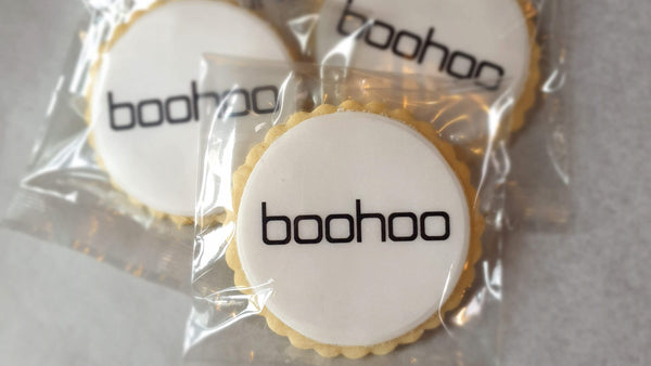 Boohoo branded biscuits individually wrapped in transparent compostable bags