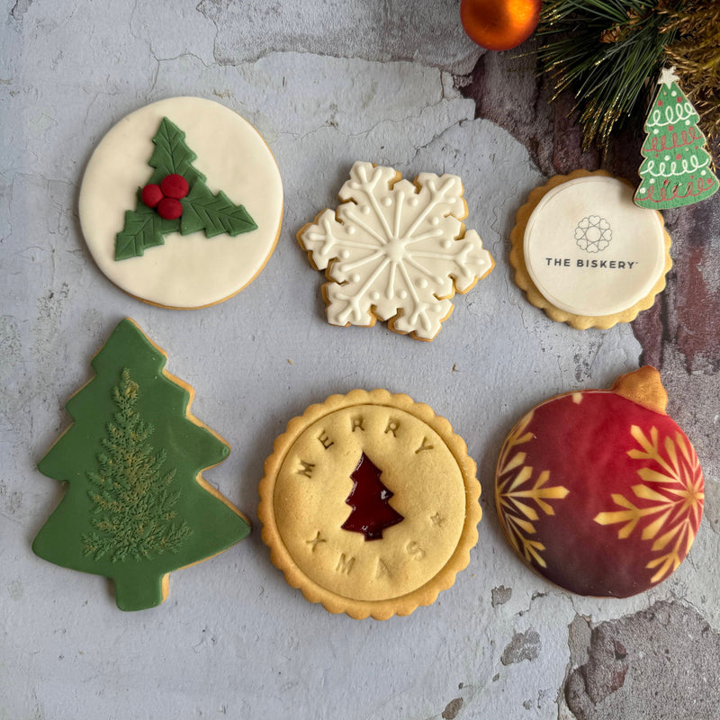 Christmas tree, bauble, jam biscuit, branded biscuit, Holly and snowflake biscuit selection.