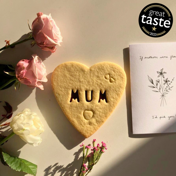 Sweet Mother's Day treat: heart-shaped cookie with "Mum" and a love note