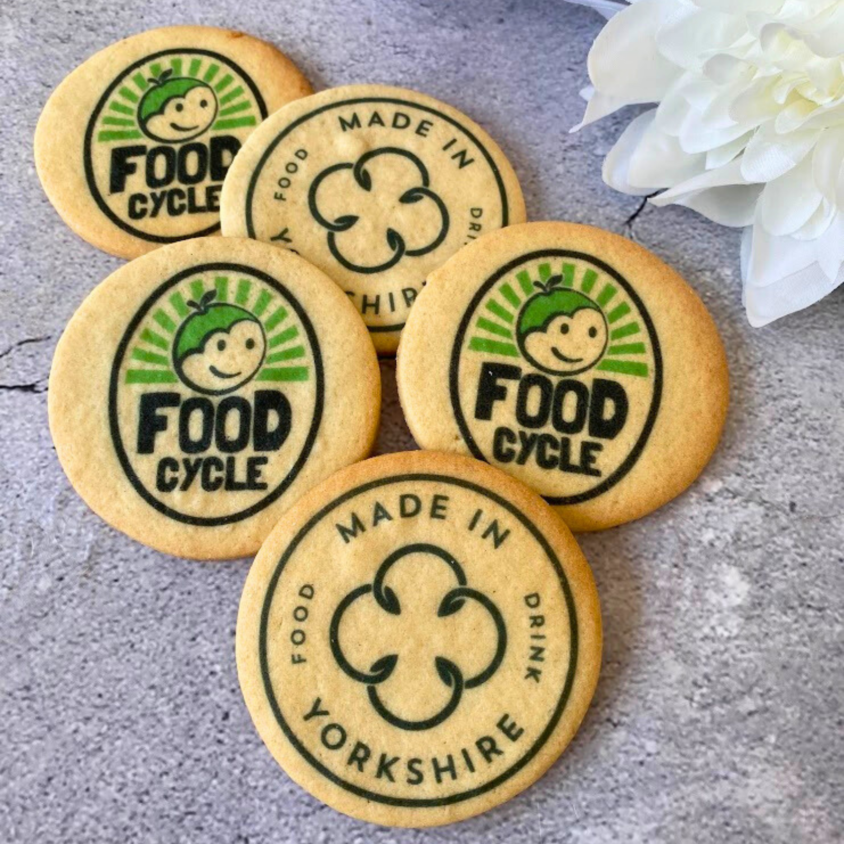 Delicious round butter cookies printed with green "Food Cycle" and "Made in Yorkshire"