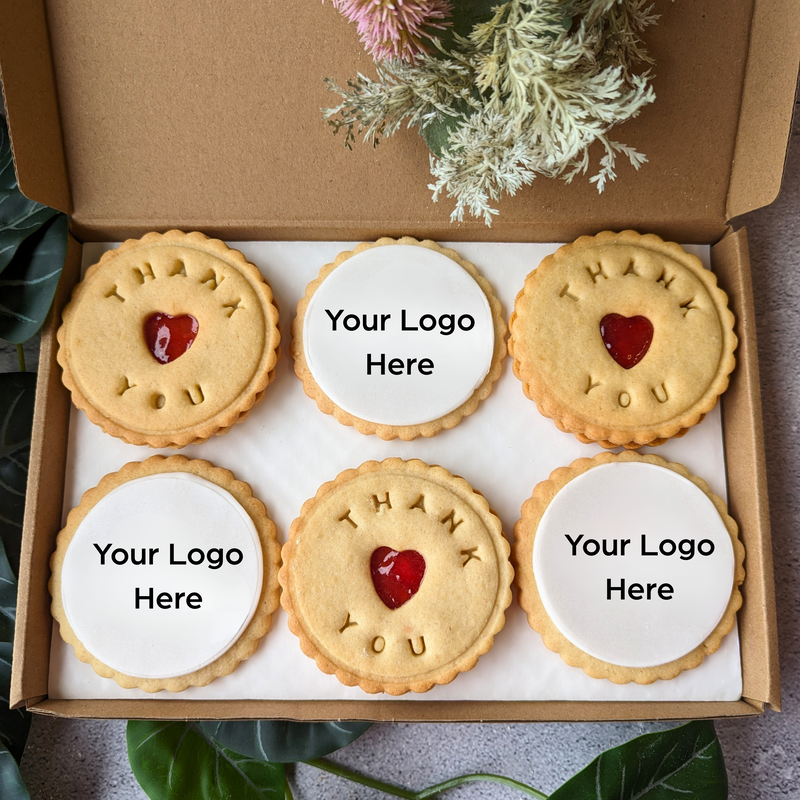 Gift box of 6 branded cookies: 3 jammy cookies with "Thank You" and 3 with "The Biskery" logo.