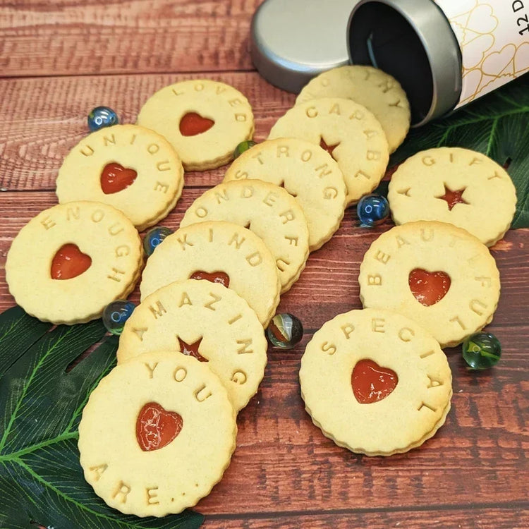 biscuits from a tin that have kind words engraved