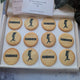Gift box of 12 butter biscuits printed with Sandbox branding, arranged in three rows of four.