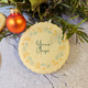 A Christmas ornament and a cookie with the words "You are Anique" on it