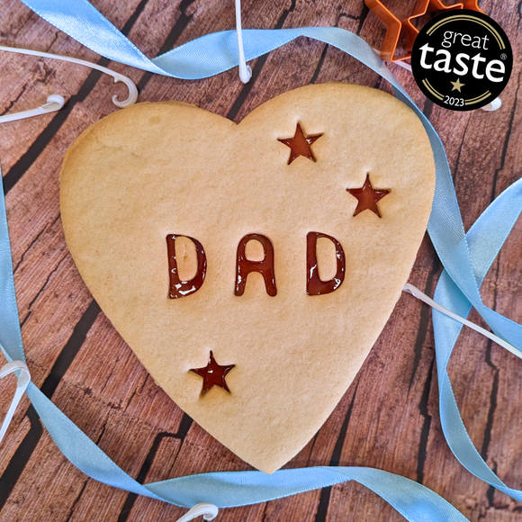 Sweet and decadent heart-shaped biscuits with jam filling for Father's day