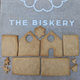 DIY Kits from The Biskery Company, featuring a small gingerbread house, perfect for creative and festive fun.