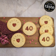 A plate of biscuits with the words "Happy 40th Birthday" written on them.