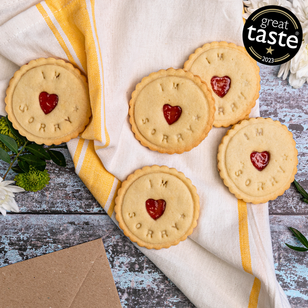 A plate of 'I'm Sorry' Biscuits with flowers 