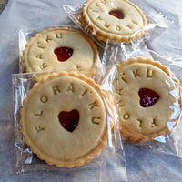 4 Impressed branded jam biscuits. PAckaged in eco-friendly transparent bags. Ready to go be posted out for a corporate event