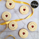  Neatly arranged biscuits on a table, each decorated with "Will You Be My Bridesmaid?" A perfect gift for a bridesmaid.