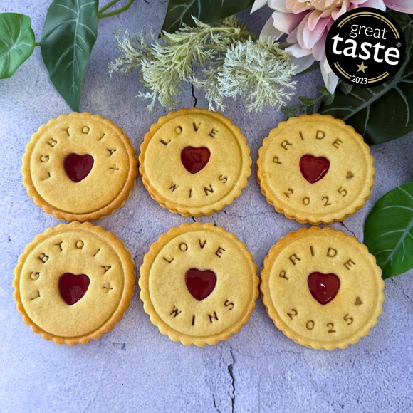  jam cookies with the words "LGBTQIA+", "LOVE WINS", and "PRIDE 2025" impressed on them