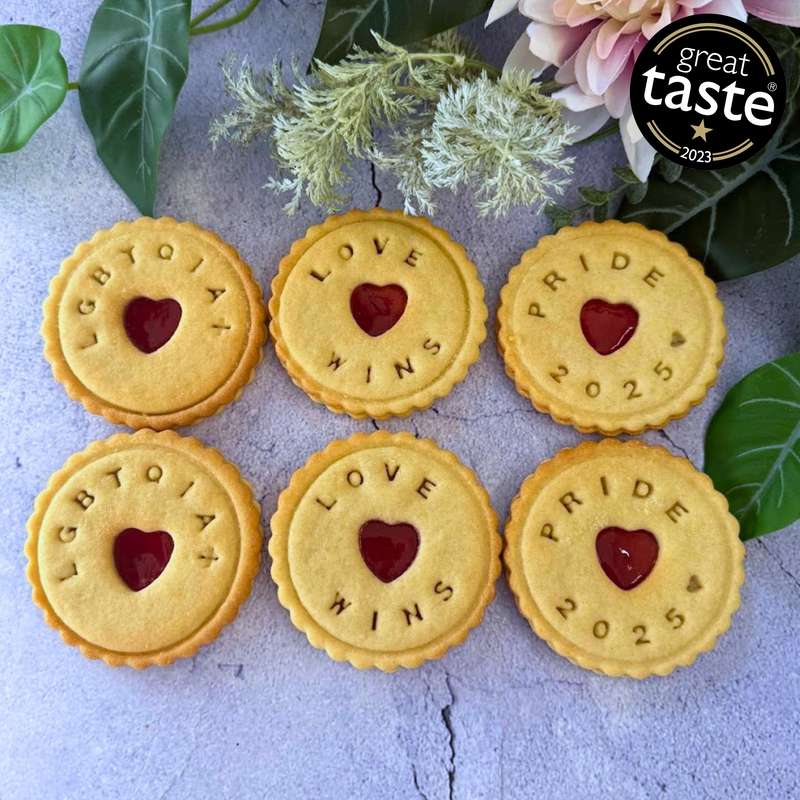  jam cookies with the words "LGBTQIA+", "LOVE WINS", and "PRIDE 2025" impressed on them