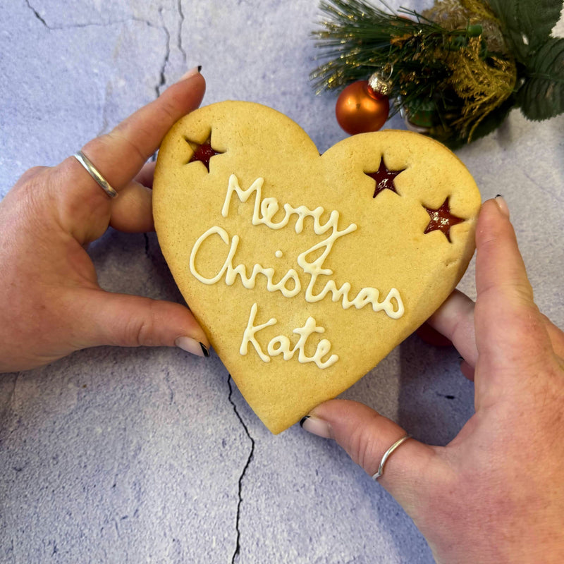 Giant Merry Christmas Cookie with "Merry Christmas Kate" piped in icing
