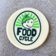 Round fondant biscuit printed with the green FoodCycle logo