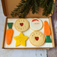 A close-up of a box of biscuits gift for Santa