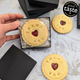 Box of heart-shaped biscuit with "Thank You" written on them. The Biskery, personalised biscuit company. Free shipping to the UK