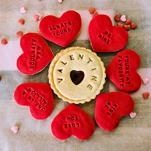 Valentine's Day bouquet of heart-shaped cookies with messages of love 