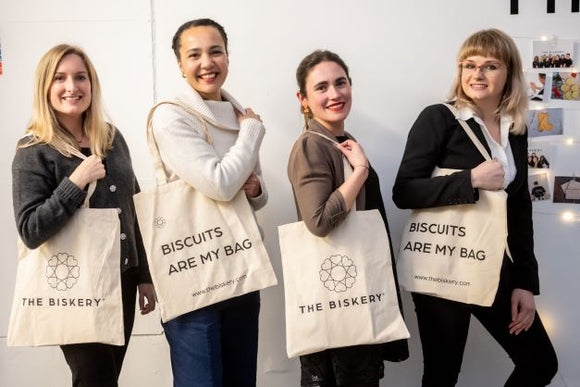 The Biskery Tote bag modelled by some of the team